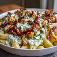 Creamy One-Pot French Onion Chicken Pasta with golden caramelized onions and melted Gruyère cheese.